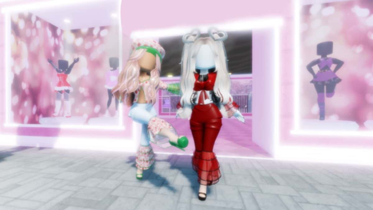 Two dolls outside shopping mall in Dollista
