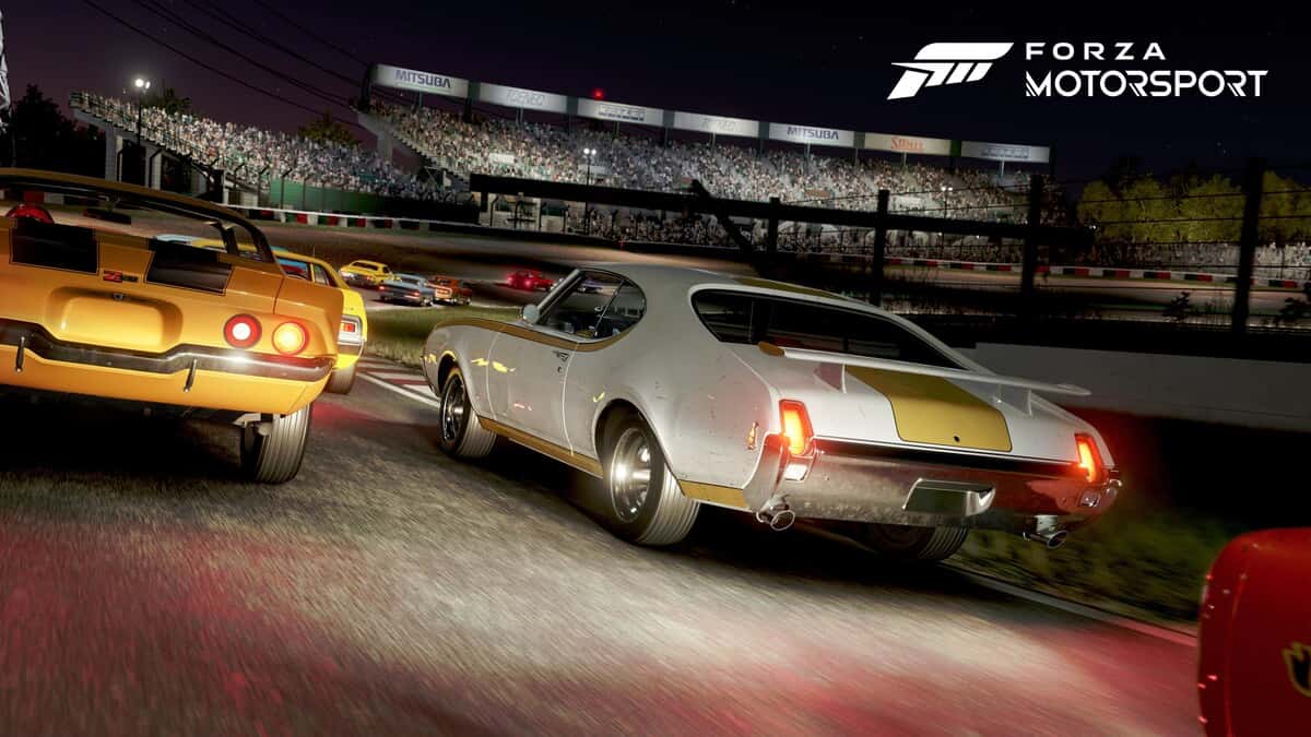 Two cars racing at night in Forza Motorsport