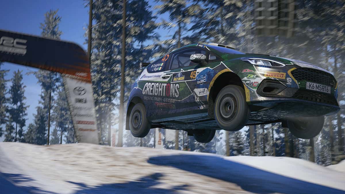 Car flying in a snow track in EA Sports WRC