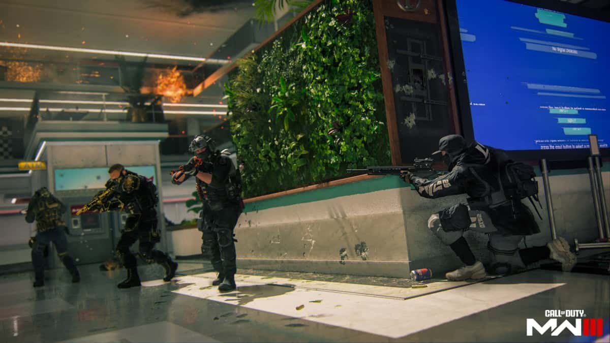 MW3 operators taking cover and holding weapons