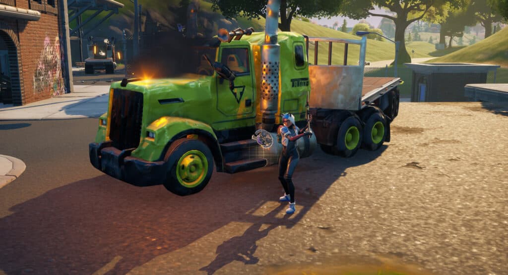 Fortnite player destroying a truck. 