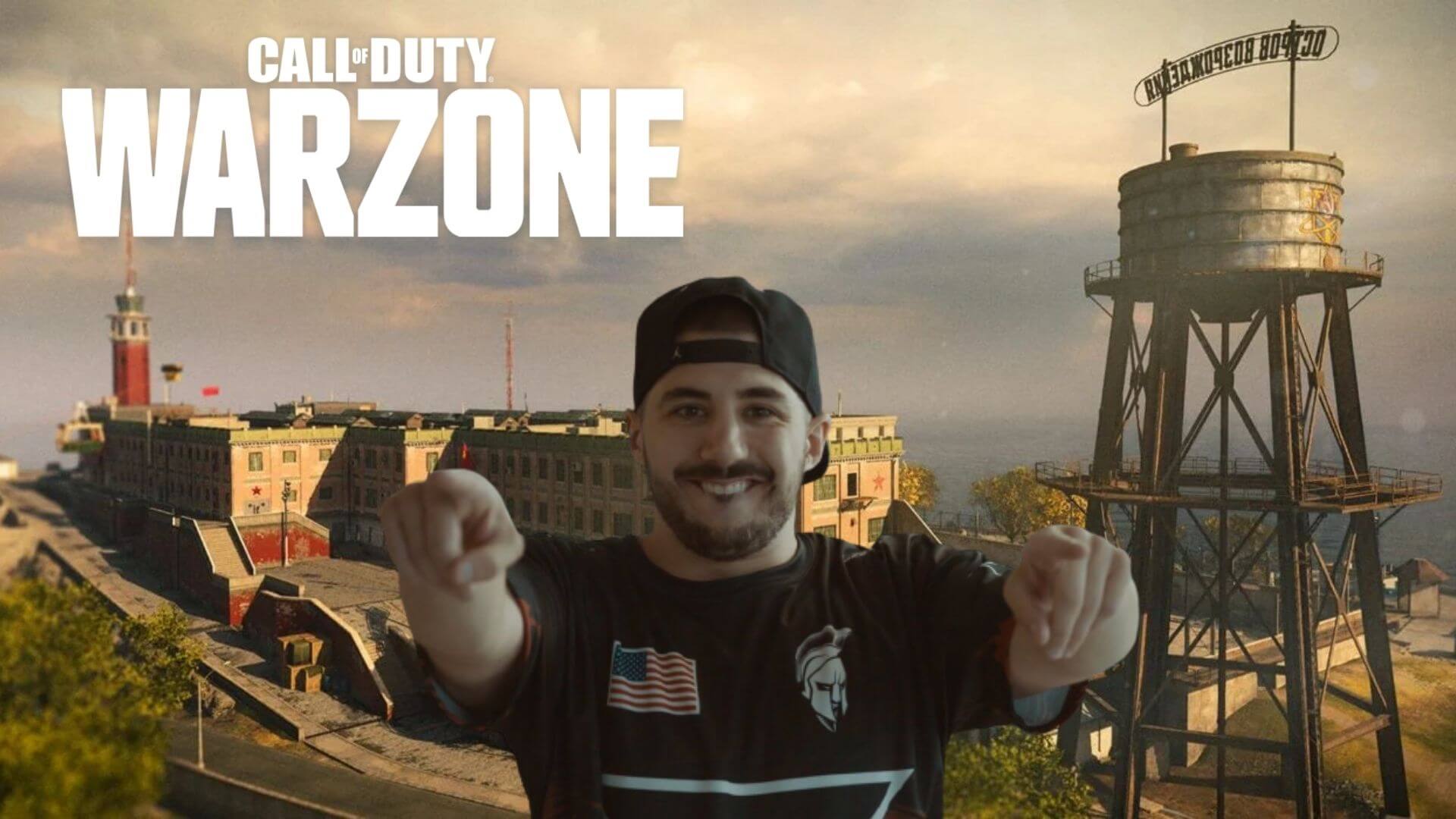 nickmercs posing in front of rebirth island in warzone