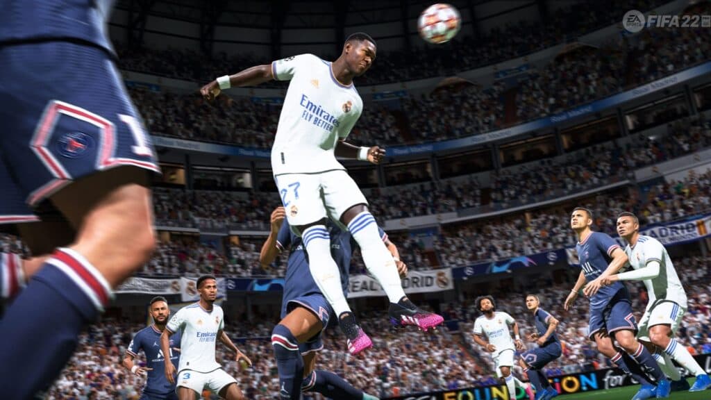 Real Madrid player heading the ball in FIFA 22