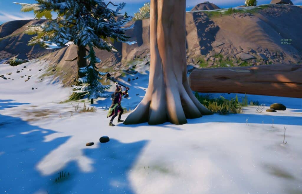 Player knocking down Pine Timbers in Fortnite