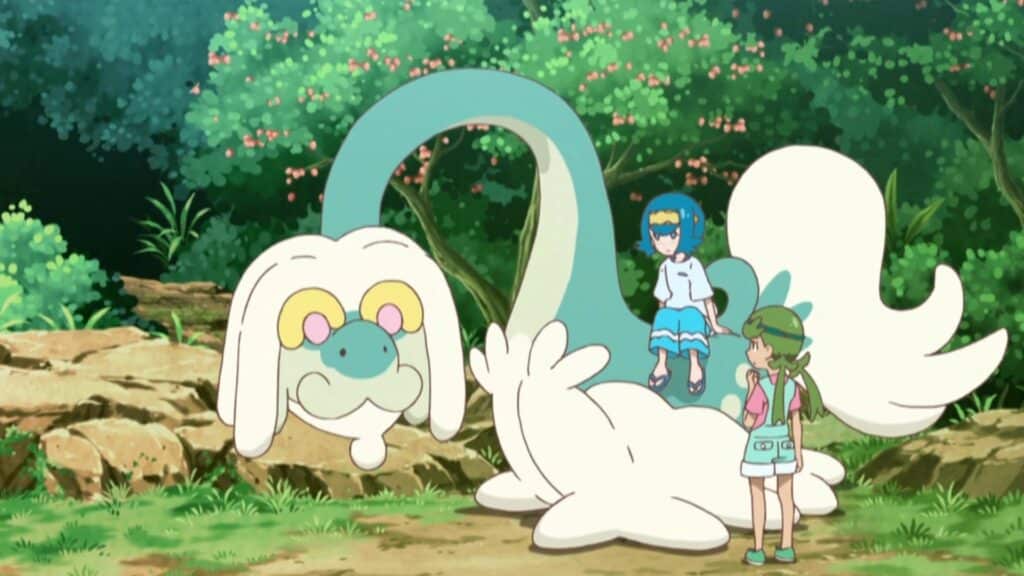 Some children hanging out with Dragon type Pokemon 