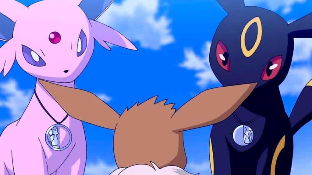 Unbreon and Espeon staring Eevee in Pokemon