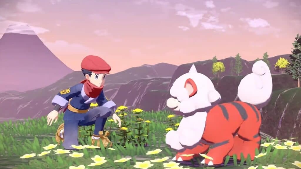 Hisuian Growlithe and a Pokemon trainer