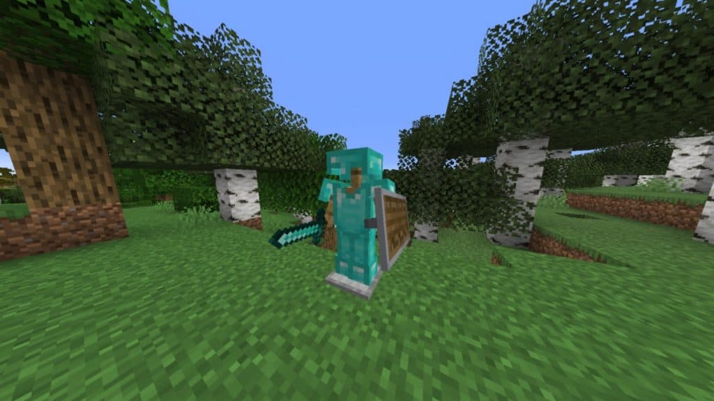 Armor stand with diamond armor, a diamond sword, and a shield in Minecraft.