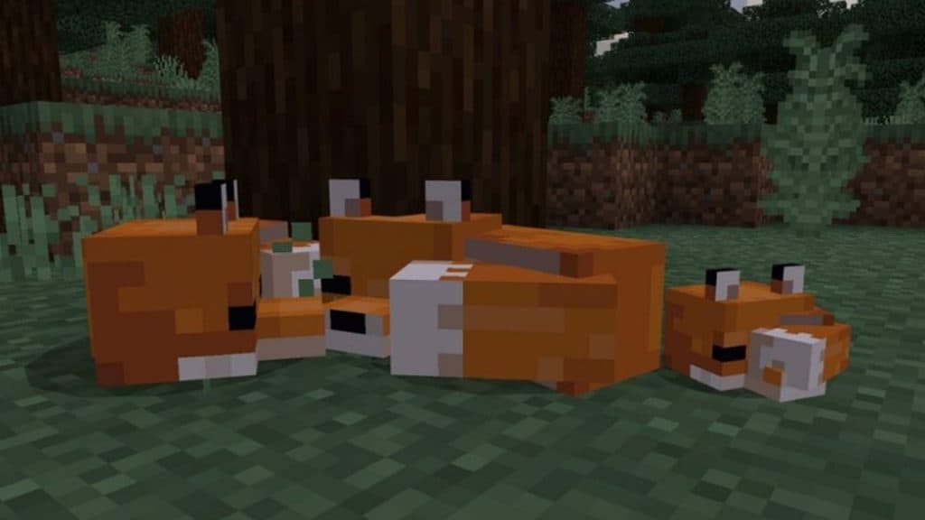 A fox family in Minecraft