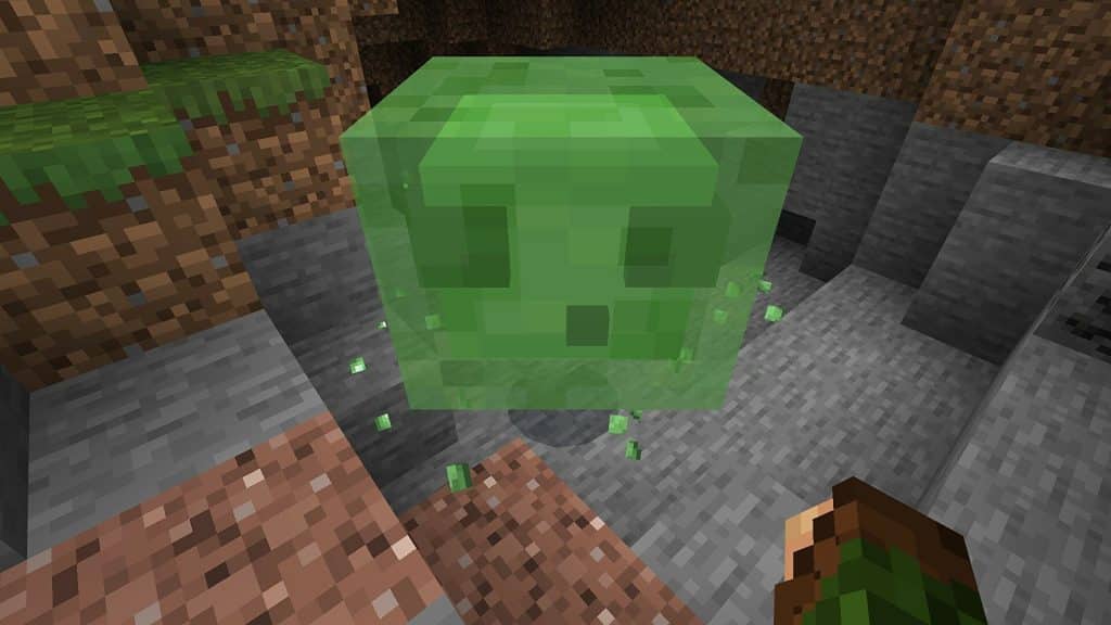 A Slime coming out of a cave.