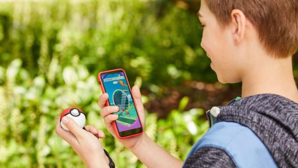 Pokemon Trainer with a Pokeball Plus