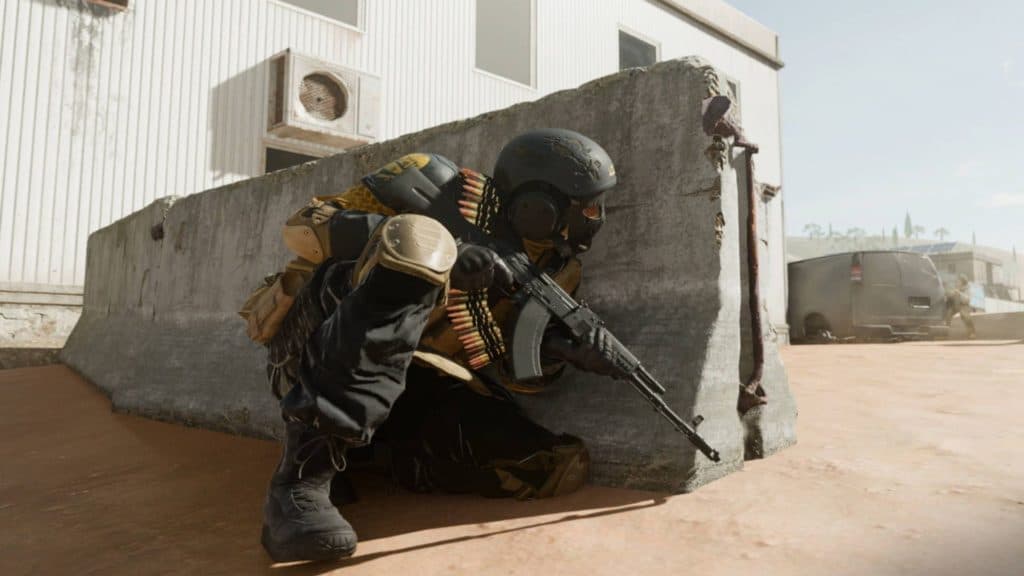 warzone 2 operator hiding behind a wall