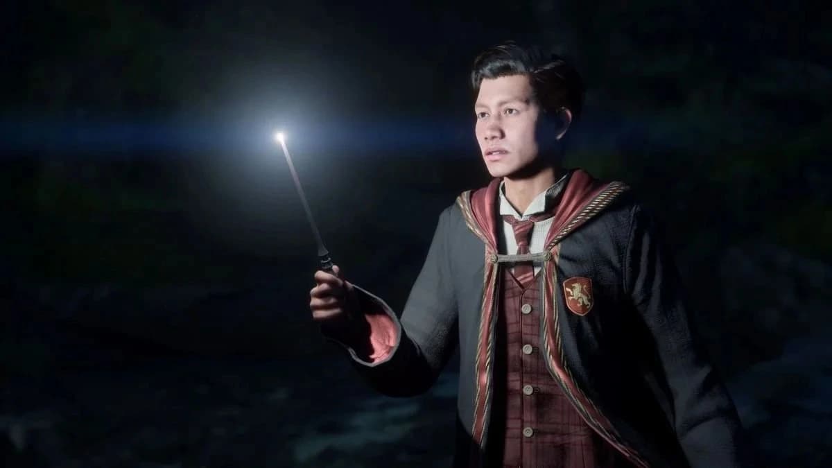 hogwarts legacy character holding a wand