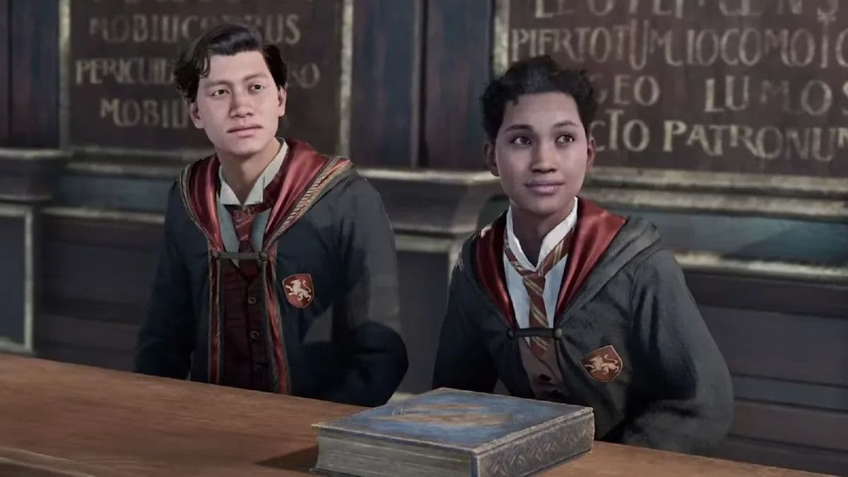 Two Hogwarts Legacy characters sitting next to each other