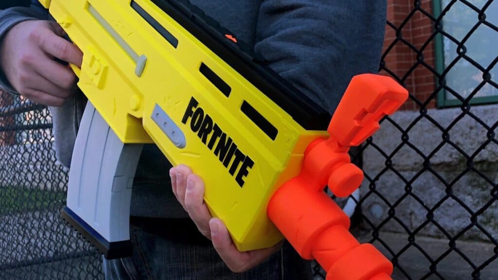 A person holding a Fortnite NERF gun