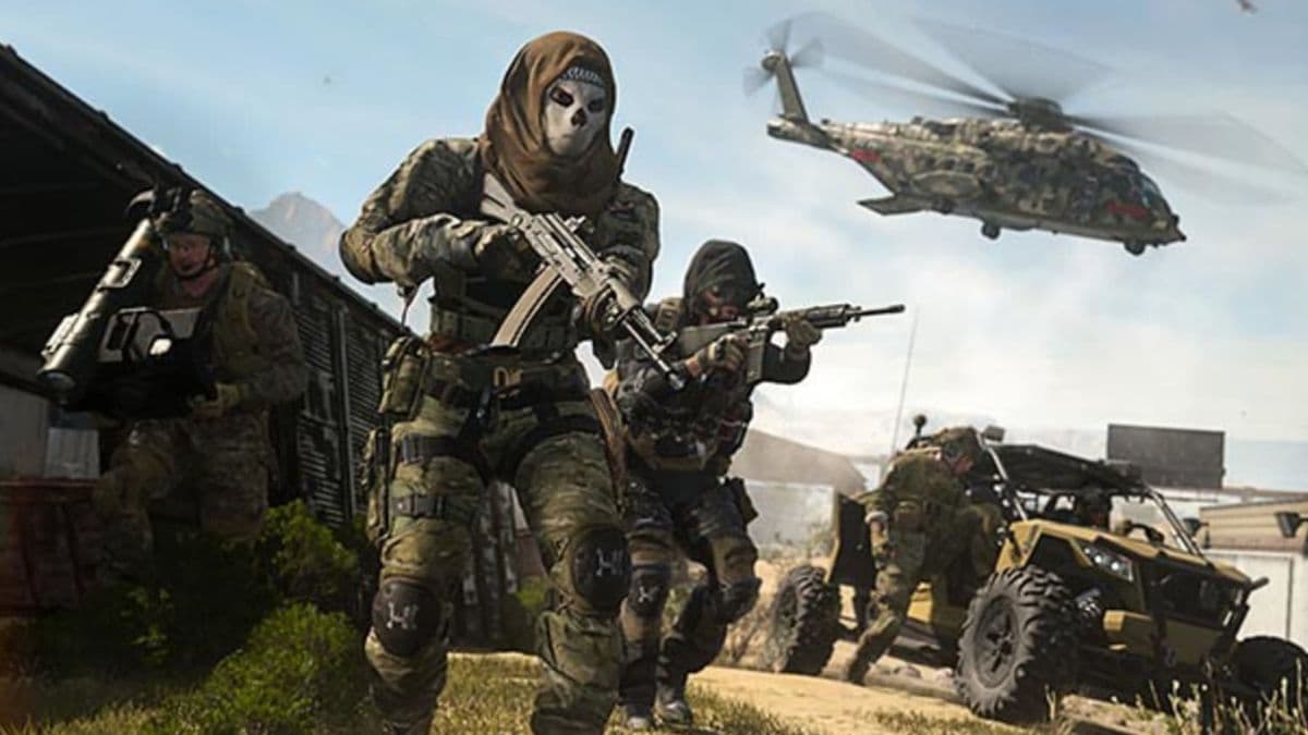modern warfare 2 operators running with helicopter and vehicle in the background
