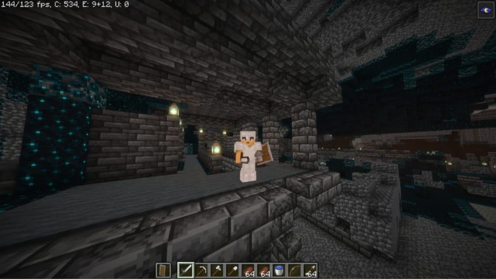 A Minecraft player wearing iron armor in an Ancient City