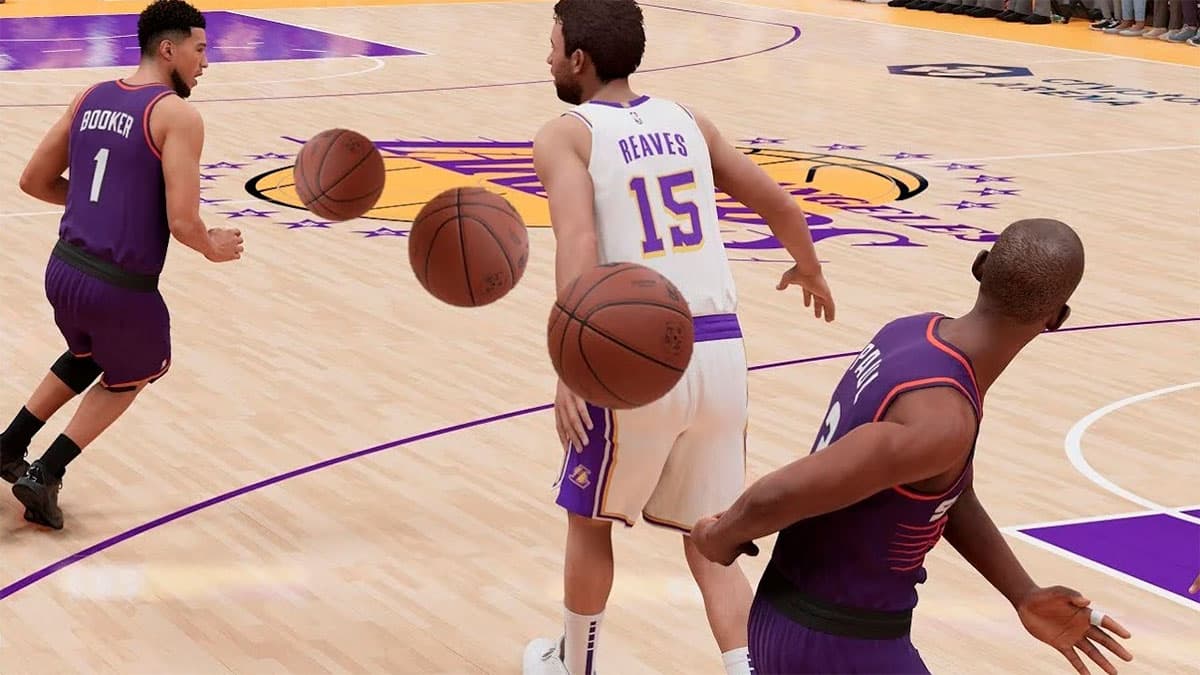 Devin Booker receiving a flashy pass against Austin Reaves in NBA 2K24