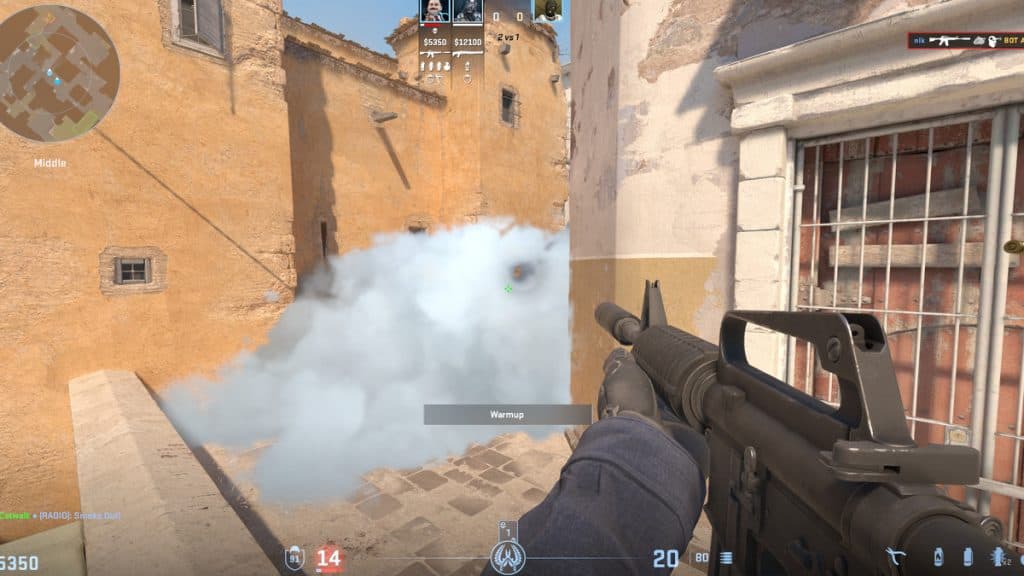Shooting through a smoke on Dust 2 in CS2