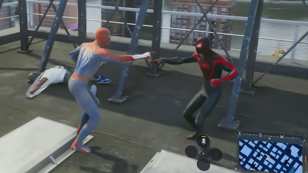 Peter Parkey and Miles Morales doing the Spider-Man pointing meme in Marvel's Spider-Man 2.
