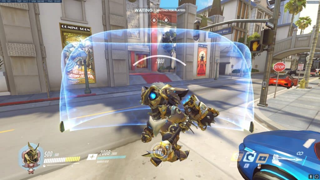 Reinhardt standing with his shield up behind an Orissa shield
