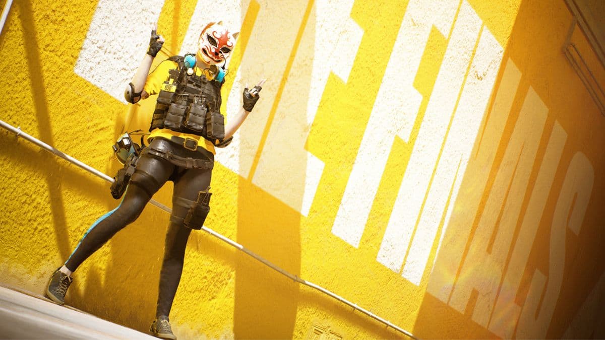 The Finals contestant standing in front of yellow wall