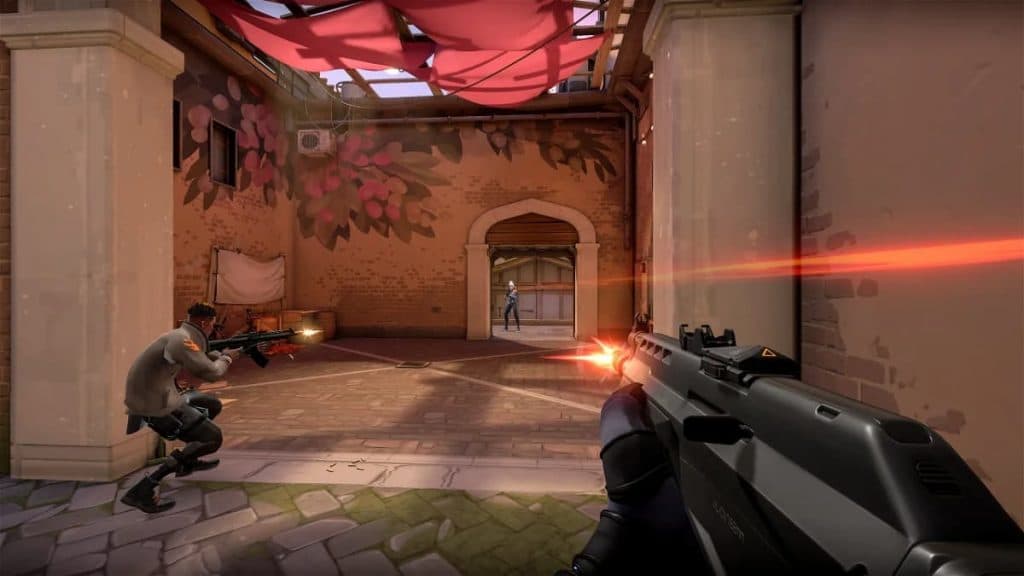 An in-game screenshot of a gunfight in Valorant.
